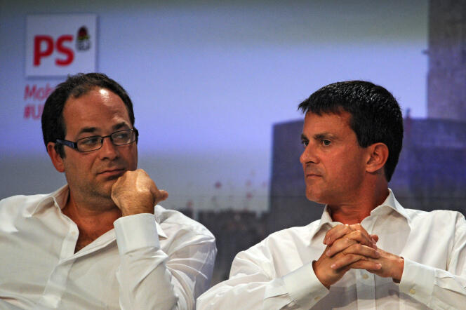 Emmanuel Maurel et Manuel Valls, à La Rochelle, en 2013.