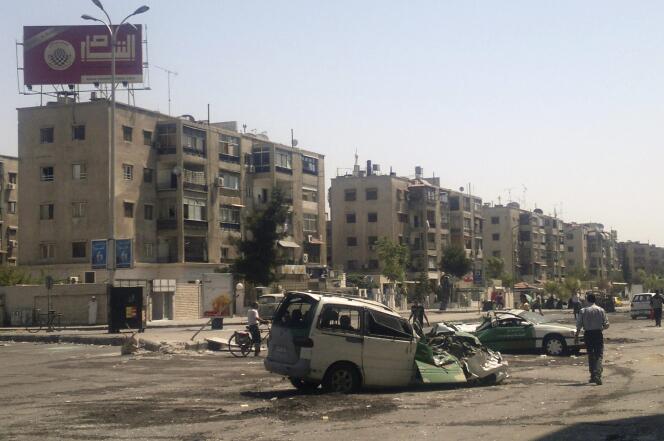 Après des combats entre rebelles syriens et militaires dans le camp de Yarmouk, en 2012.