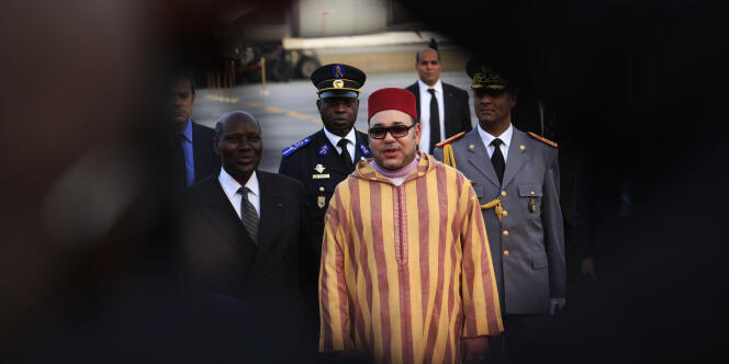Mohammed VI lors d’une visite à Abidjan, le 23 février 2014.