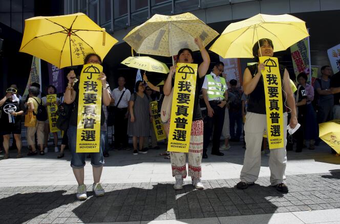 Des manifestants du camp pro-démocratie, le 18 juin à Hongkong.
