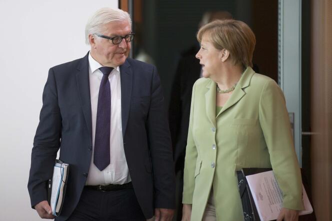 Le ministre allemand des affaires étrangères, Frank-Walter Steinmeier, et la chancelière, Angela Merkel, le 15 juillet.