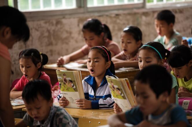 Des élèves d'une école primaire de Xianghe, dans le sud de la Chine, le 19 juin 2015.