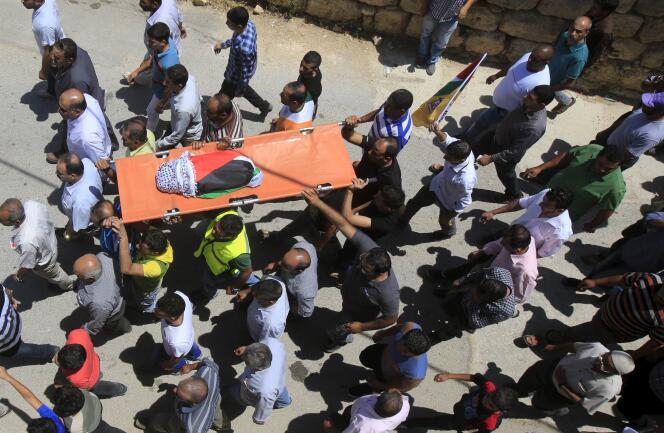 Les funérailles du petit Ali Dawabsha, 18 mois, vendredi 31 juillet, à Douma, près de Naplouse.