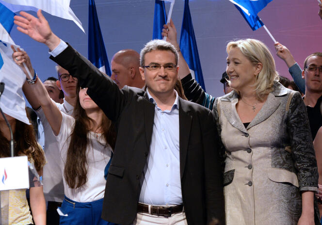 Aymeric Chauprade en compagnie de la présidente du FN, lors de la campagne pour les élections européennes, le 18 mai 2014.