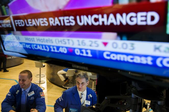 Des traders de la Bourse de New York après l’annonce de la Réserve fédérale, le 28 octobre.
