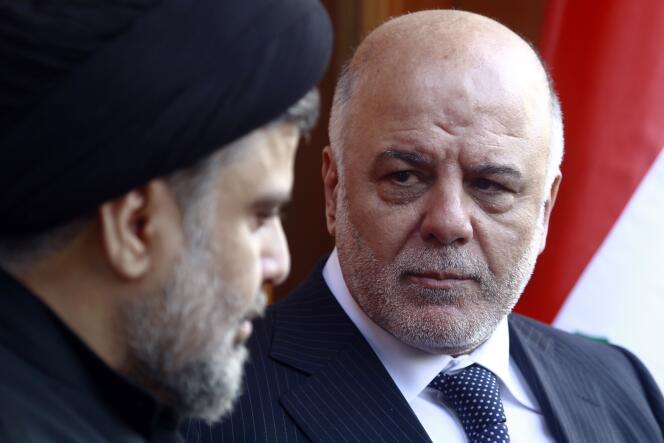 Le premier ministre irakien Haider Al-Abadi (à droite) avec Moqtada Al-Sadr, à Najaf, le 7 novembre 2015.
