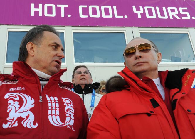 Vladimir Poutine et le ministre russe des sports, Vitaly Mutko, le 16 février 2014 à Sotchi.