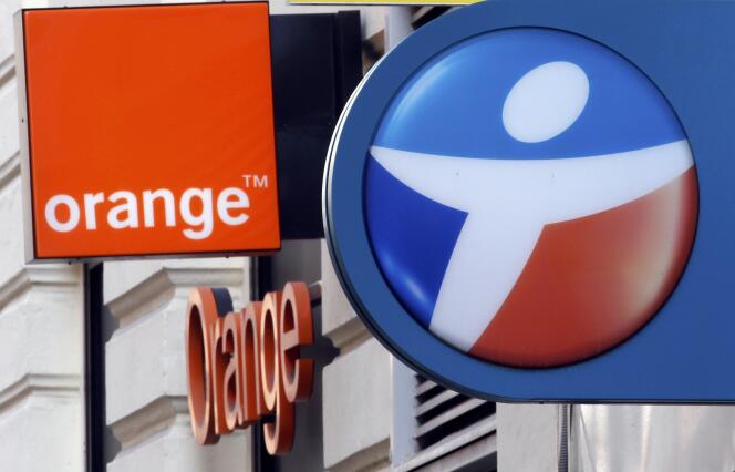 French telecom operators Bouygues Telecom and Orange logos are seen on mobile phone stores front in Marseille, France, December 15, 2015. France's Economy Minister said on Monday he did not oppose in principle a consolidation of the country's telecoms sector to three operators from four, as state-controlled telecoms group Orange started talks about possibly buying a stake in Bouygues Telecom. REUTERS/Jean-Paul Pelissier