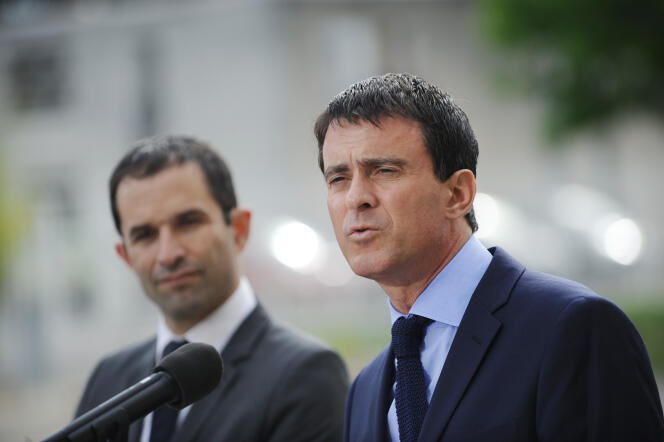 Manuel Valls et Benoît Hamon, alors ministre de l'éducation, le 23 juin 2014.