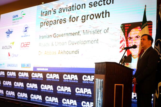 Iranian minister of transportation Abbas Ahmad Akhoundi (R) speaks during the CAPA 2016 Iran Aviation Summit in the capital Tehran, on January 24, 2016. Iran says it will buy 114 Airbus planes to revitalise its ageing fleet, in the first major commercial deal announced since the lifting of sanctions under its nuclear agreement. News of the Airbus deal came as aviation representatives from 85 companies met in Tehran to assess ways to do business in the Islamic republic after sanctions were removed.  / AFP / STR
