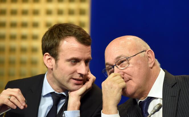 Emmanuel Macron, ministre de l'économie, et Michel Sapin, ministre des finances, à Paris, le 9 février.