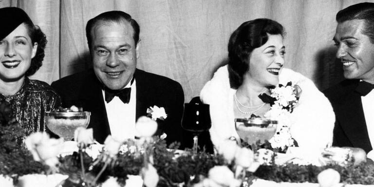 From left, Norma Shearer, MGM Vice President Eddie Mannix, (aka E.J. Mannix), Bernice Mannix, Clark Gable, at Marie Dressler's birthday party, November 10, 1933