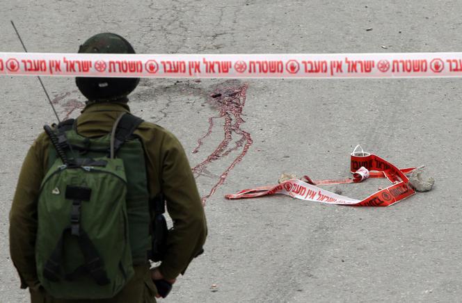 Un soldat israélien est accusé d'avoir abattu un Palestinien blessé et ne présentant pas de menace, le 24 mars 2016 à Hébron, en Cisjordanie.