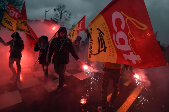 Des militants de la CGT pendant la manifestation du 31 mars contre la loi Travail, à Paris.