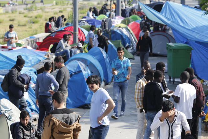 Des réfugiés dans un camp à Paris le 27 mai.