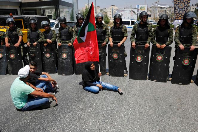 Manifestation de soutien à des Palestiniens en grève de la faim dans une prison israélienne, à Ramallah, le 9 août 2016.