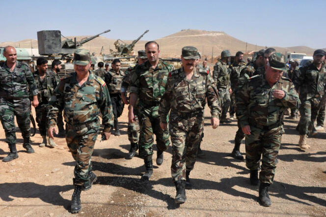 Des membres de l’armée gouvernementale syrienne à Alep le 9 août.