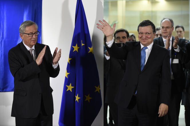 José Manuel Barroso, président sortant de la Commission européenne, quitte le siège de la Commission européenne sous les applaudissements de son successeur Jean-Claude Juncker, à Bruxelles, le 30 octobre 2014.