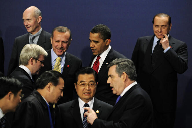 Pascal Lamy (top L) with then Britain's Prime Minister Gordon Brown (bottom R), China's President Hu Jintao (C) and Italy's Prime Minister Silvio Berlusconi (top R) at the G20 summit in London on April 2, 2009. Lamy was wiretaped by British intelligence ahead of this crucial meeting.