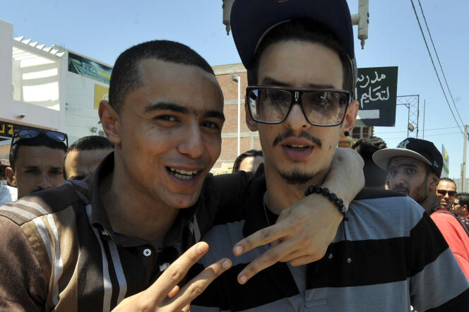 Le rappeur Weld El 15, en compagnie de son acolyte Emino, à Tunis, le 13 juin 2013.