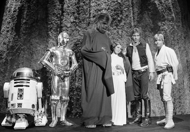 Aux côtés de Kenny Baker, Anthony Daniels, Peter Mayhew, et Harrison Ford, et Mark Hamill, en 1978.