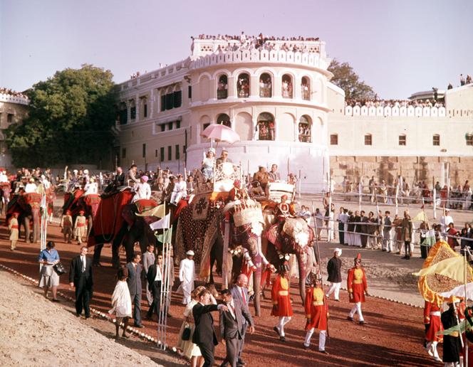 During the royal tour of India in 1961, Queen Elizabeth II on an elephant in the city of Benares.