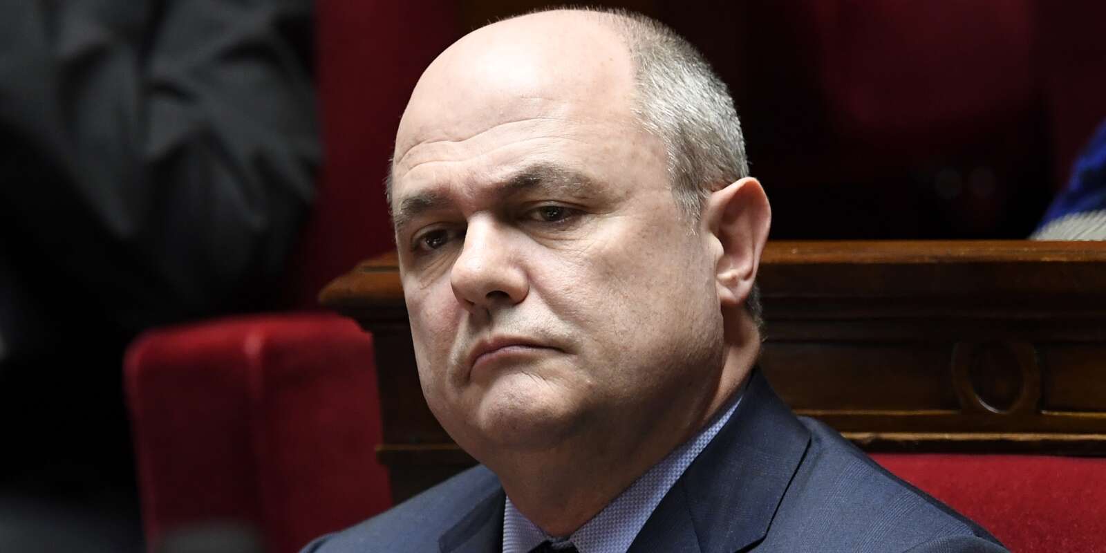 (FILES) This file photo taken on December 20, 2016 shows French Interior Minister Bruno Le Roux attending a session of questions to the government at the National Assembly in Paris. France's Interior Minister Bruno Le Roux was fighting for political survival on March 21, 2017 after it emerged that he hired his two teenage daughters as parliamentary assistants, earning comparisons with scandal-hit presidential hopeful Francois Fillon. Le Roux was to meet with Socialist Prime Minister Bernard Cazeneuve to provide explanations over the latest revelations to engulf an already embattled French political class. / AFP / Bertrand GUAY