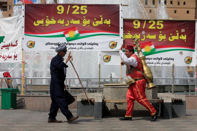 Pancartes appelant au référendum, à Erbil, le 21 septembre.