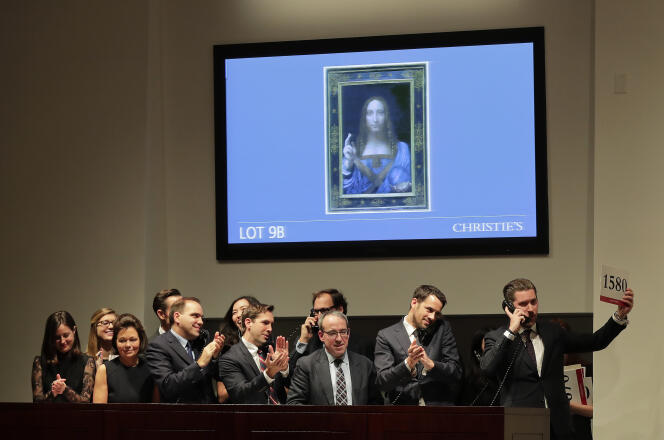 Lors de la vente aux enchères du « Salvator Mundi », toile de Léonard de Vinci, chez Christie’s, à Londres, le 15 novembre 2017.