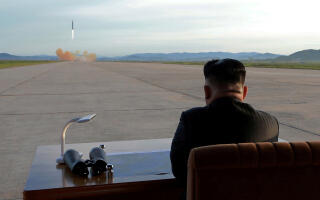 FILE PHOTO: North Korean leader Kim Jong Un watches the launch of a Hwasong-12 missile in this undated photo released by North Korea's Korean Central News Agency (KCNA) on September 16, 2017. To match Insight NORTHKOREA-KIMJONGUN/ KCNA via REUTERS/File Photo ATTENTION EDITORS - THIS PICTURE WAS PROVIDED BY A THIRD PARTY. REUTERS IS UNABLE TO INDEPENDENTLY VERIFY THE AUTHENTICITY, CONTENT, LOCATION OR DATE OF THIS IMAGE. NO THIRD PARTY SALES. SOUTH KOREA OUT