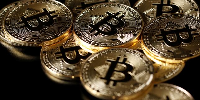 Démantèlement d'une vaste escroquerie internationale de faux placements en bitcoins