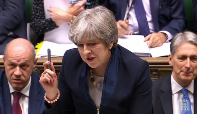 La première ministre britannique, Theresa May, lors du débat sur le Brexit, à la Chambre des communes, à Londres, le 13 décembre.