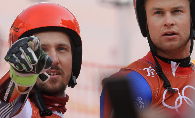 L’Autrichien Marcel Hirscher (or) et Alexis Pinturault (bronze), peu avant la remise des médailles du slalom géant des Jeux de Pyeongchang, le 18 février 2018.