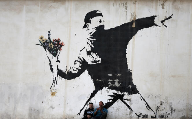Photo d’illustration : un graffiti de Banksy dans les territoires palestiniens, photographié en 2015. AFP PHOTO / THOMAS COEX