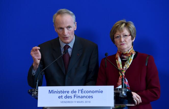 La présidente de Vigeo-Eiris Nicole Notat et le patron de Michelin Jean-Dominique Senard présentent leur rapport sur l’entreprise et l’intérêt général au ministère de l’économie à Paris, le 9 mars.