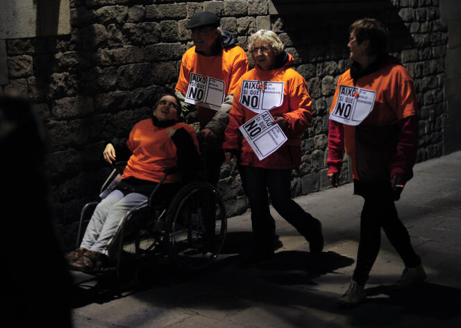 Manifestation contre les coupes du gouvernement dans les services sociaux, à Barcelone, le 3 décembre 2012, lors de la Journée internationale des personnes handicapées (IDPwD).