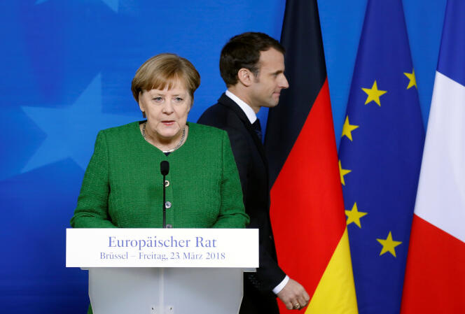 FILE PHOTO: German Chancellor Angela Merkel and France's President Emmanuel Macron hold joint news conference at a European Union leaders summit in Brussels, Belgium, March 23, 2018.