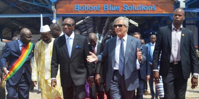 Le président guinéen, Alpha Condé, et l’homme d’affaires Vincent Bolloré, à Conakry, le 12 juin 2014.