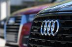 CHRISTOF STACHE / AFP The logo of German carmaker Audi is pictured on new Audi cars on the sidelines of the Audi AG annual general meeting in Ingolstadt, southern Germany, on May 9, 2018. / AFP / CHRISTOF STACHE