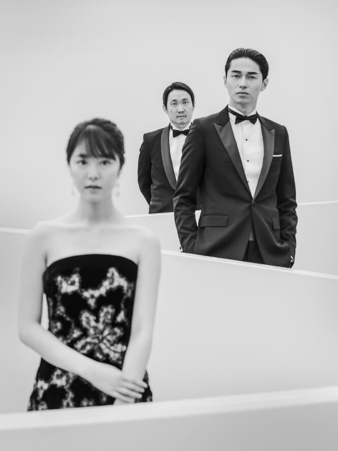 De gauche à droite : l’actrice Erika Karata, le réalisateur Ryusuke Hamaguchi et l’acteur Masahiro Higashide au Palais des festivals, à Cannes, le 14 mai 2018.