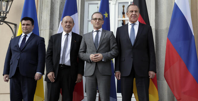 De gauche à droite, les ministres des affaires étrangères ukrainien, français, allemand et russe, lors de la réunion à Berlin, le 11 juin.