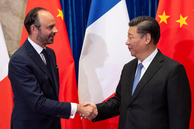 Le président chinois Xi Jinping et le premier ministre français Edouard Philippe le 25 juin à Pékin.