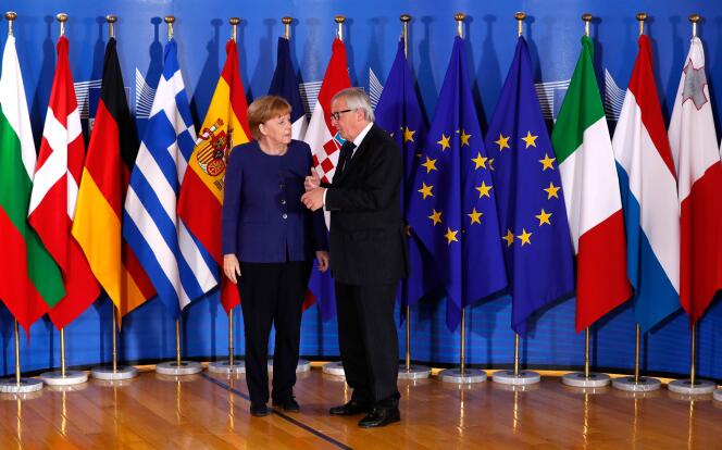 Le président de la Commission européenne, Jean-Claude Juncker, et la chancelière allemande, Angela Merkel, à Bruxelles, le 24 juin.