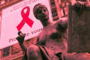 photo des toiles tendues sur la faÁade de l'HÙtel de ville ‡ Paris prise le 30 novembre 2002 ‡ la veille de la 15e journÈe mondiale de lutte contre le sida. AFP PHOTO MEHDI FEDOUACH / AFP PHOTO / MEHDI FEDOUACH