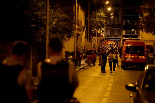 THOMAS SAMSON / AFP Police block access to the street where a fire broke out earlier August 19 in Aubervilliers