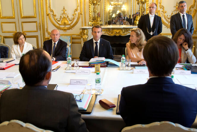 Emmanuel Macron, Gérard Collomb (à g.) et Nicole Belloubet (à d.), lors du dernier conseil des ministres avant la pause estivale, le 3 août, à l’Elysée.