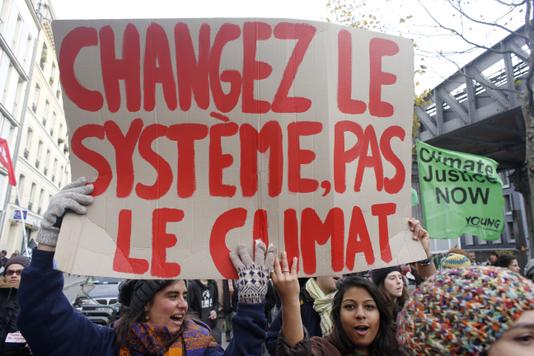 MATTHIEU ALEXANDRE / AFP Une marche pour le climat, à Paris, le 5 décembre 2015.