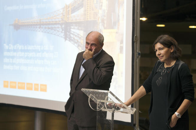 La maire de Paris, Anne Hidalgo, et son adjoint à l’urnanisme, Jean-Louis Missika, lors de l’appel a projets « Réinventer Paris », à Paris, le 3 novembre 2014.