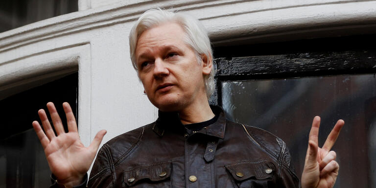 FILE PHOTO: WikiLeaks founder Julian Assange is seen on the balcony of the Ecuadorian Embassy in London, Britain, May 19, 2017. REUTERS/Peter Nicholls/FIle photo