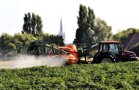 Application of pesticides in a field in Cassel, northern France, August 16, 2013.